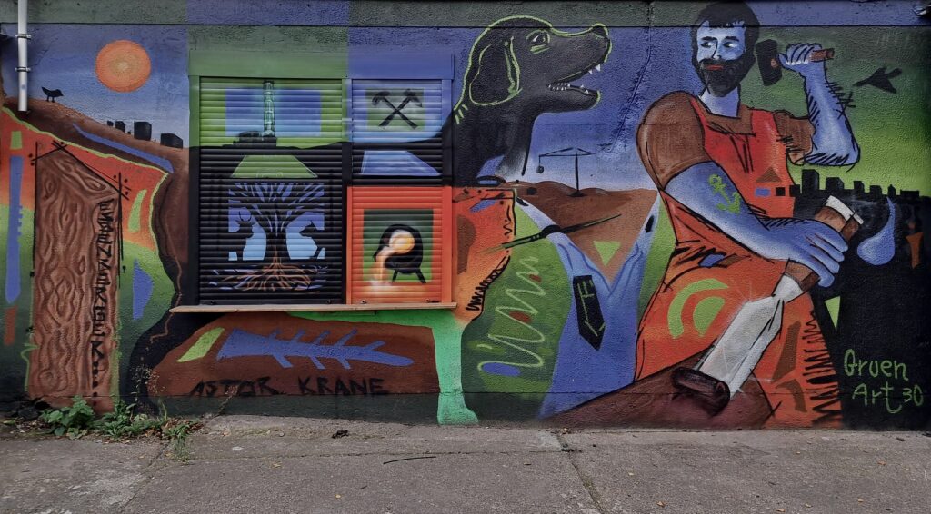 Arbeiter und Hund (Lack auf Wand, 6 x 2,5m)